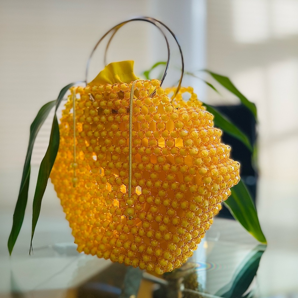 Beautiful yellow beaded bag